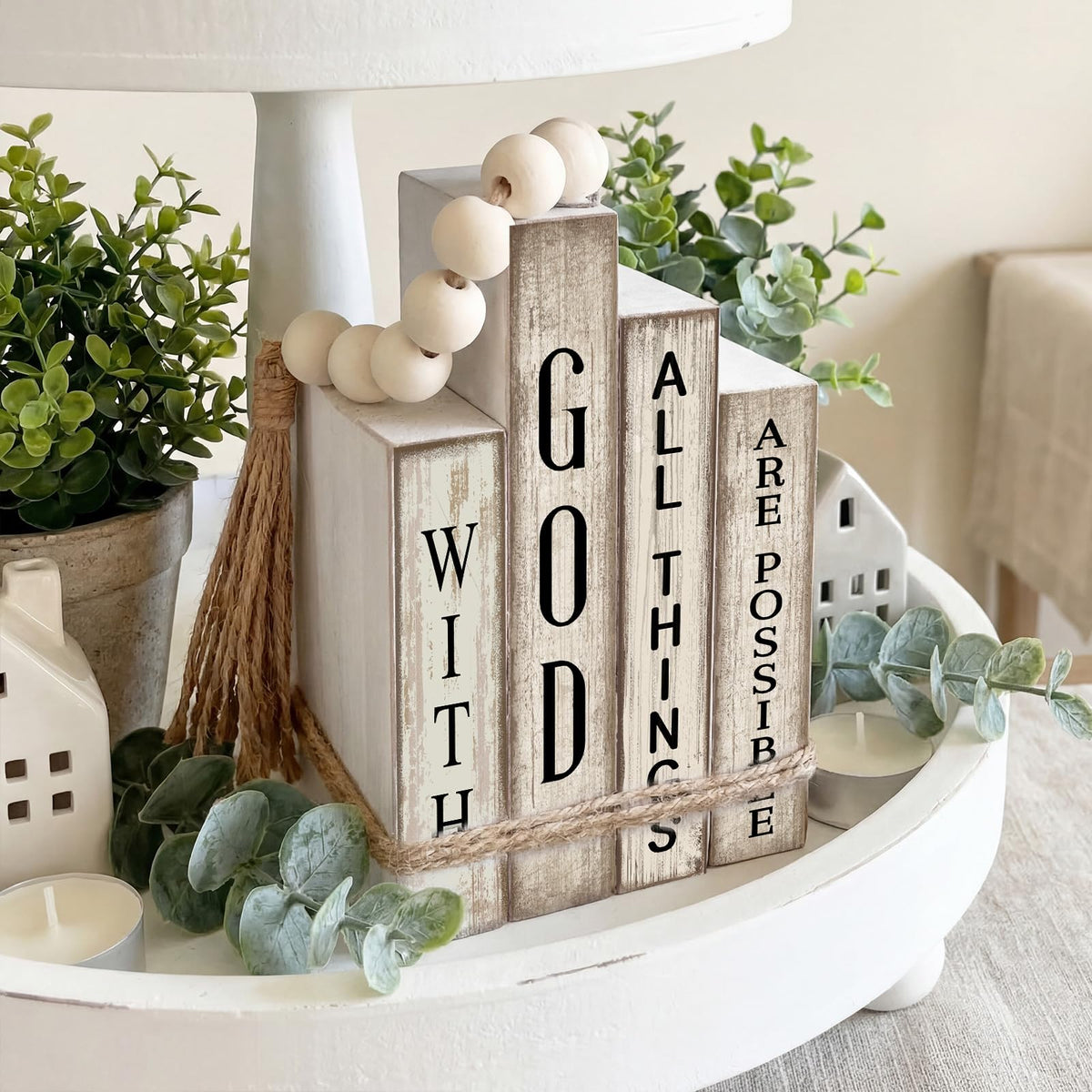 Lineshading beaded garland tassel adds texture to a coffee table display.
