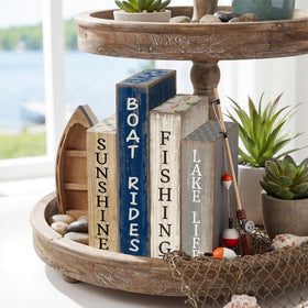 Lineshading boat rides block enhances a summer table centerpiece.