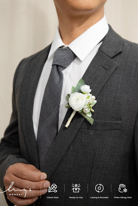 Ling's Moment white ranunculus boutonniere close-up showing realistic texture and premium materials