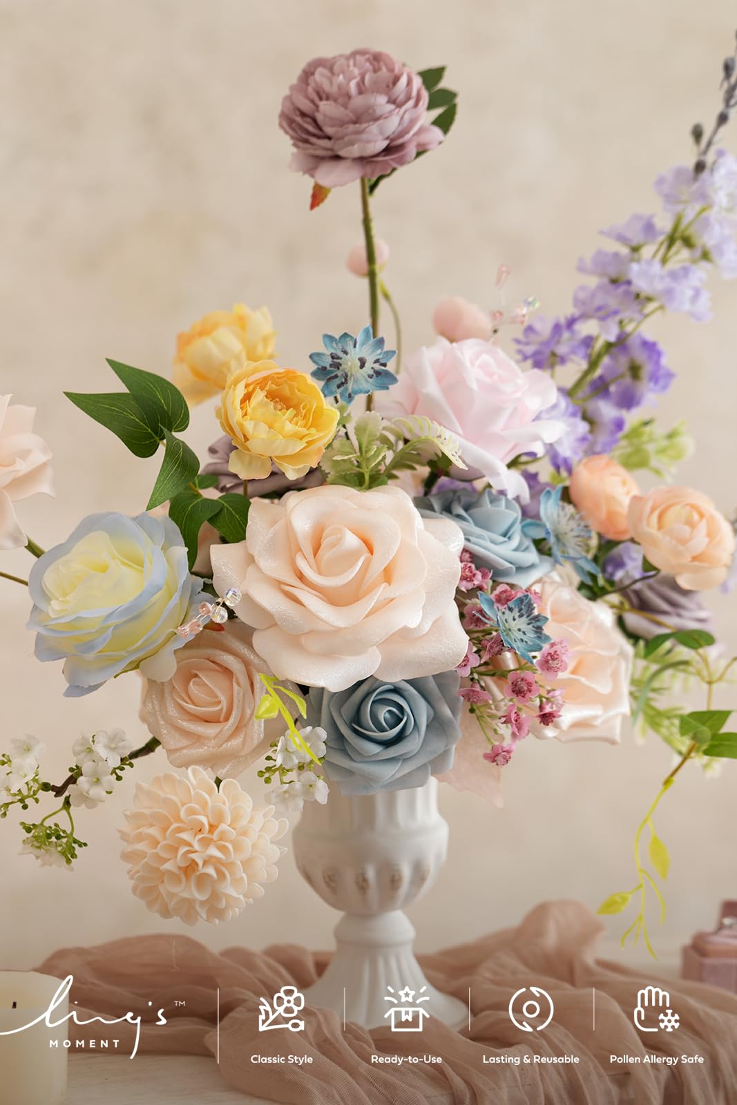 Ling's Moment powder blue and peach flowers create elegant color-coordinated centerpieces.