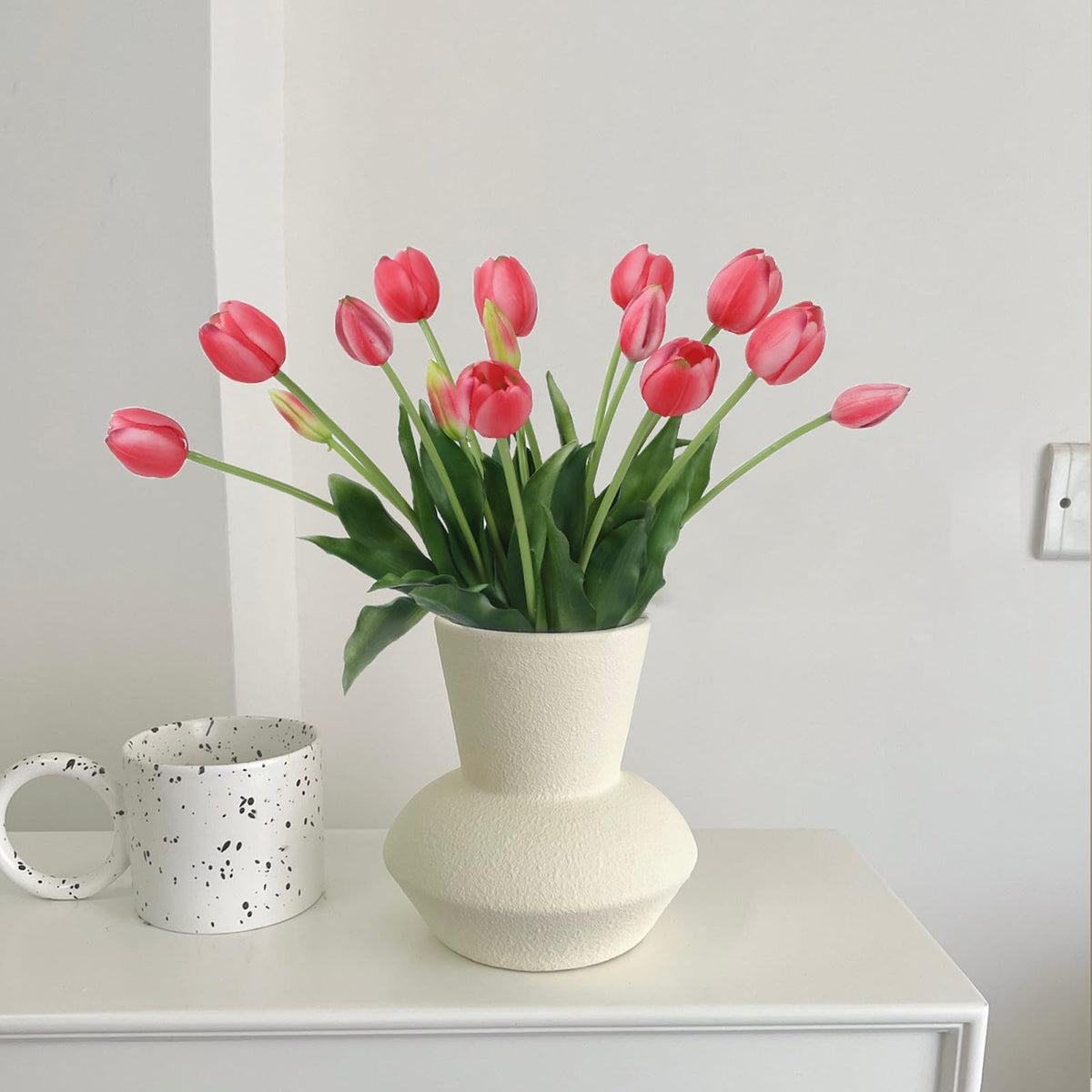 LINSIE deep pink tulips brighten dining tables and events.