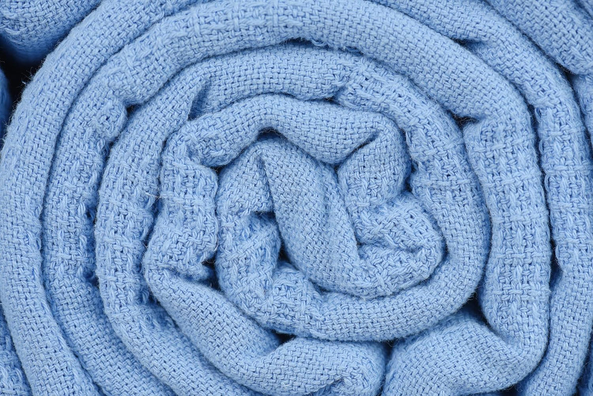 Blue Linteum Textile snagless blanket with soft texture for daily use.