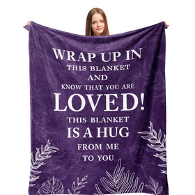Linxher Love Hug blanket on bed offers cozy warmth for relaxation.