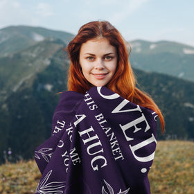 Linxher Love Hug blanket on sofa creates a perfect movie-night cocoon.