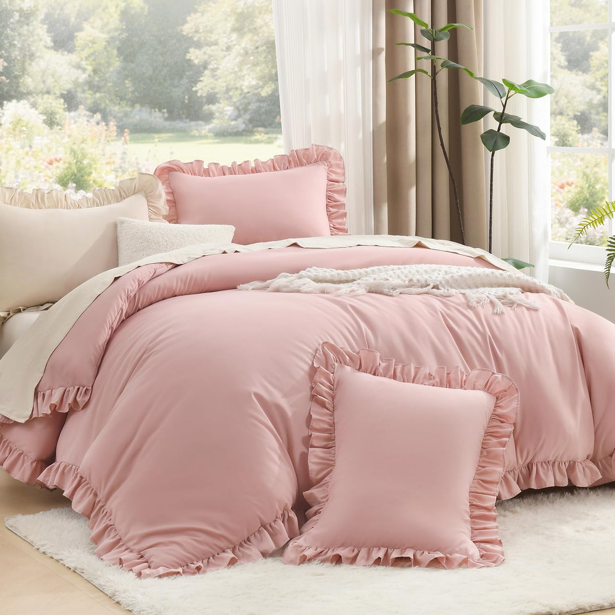 Litanika blush pink ruffle comforter on bed adds cozy, elegant appeal.