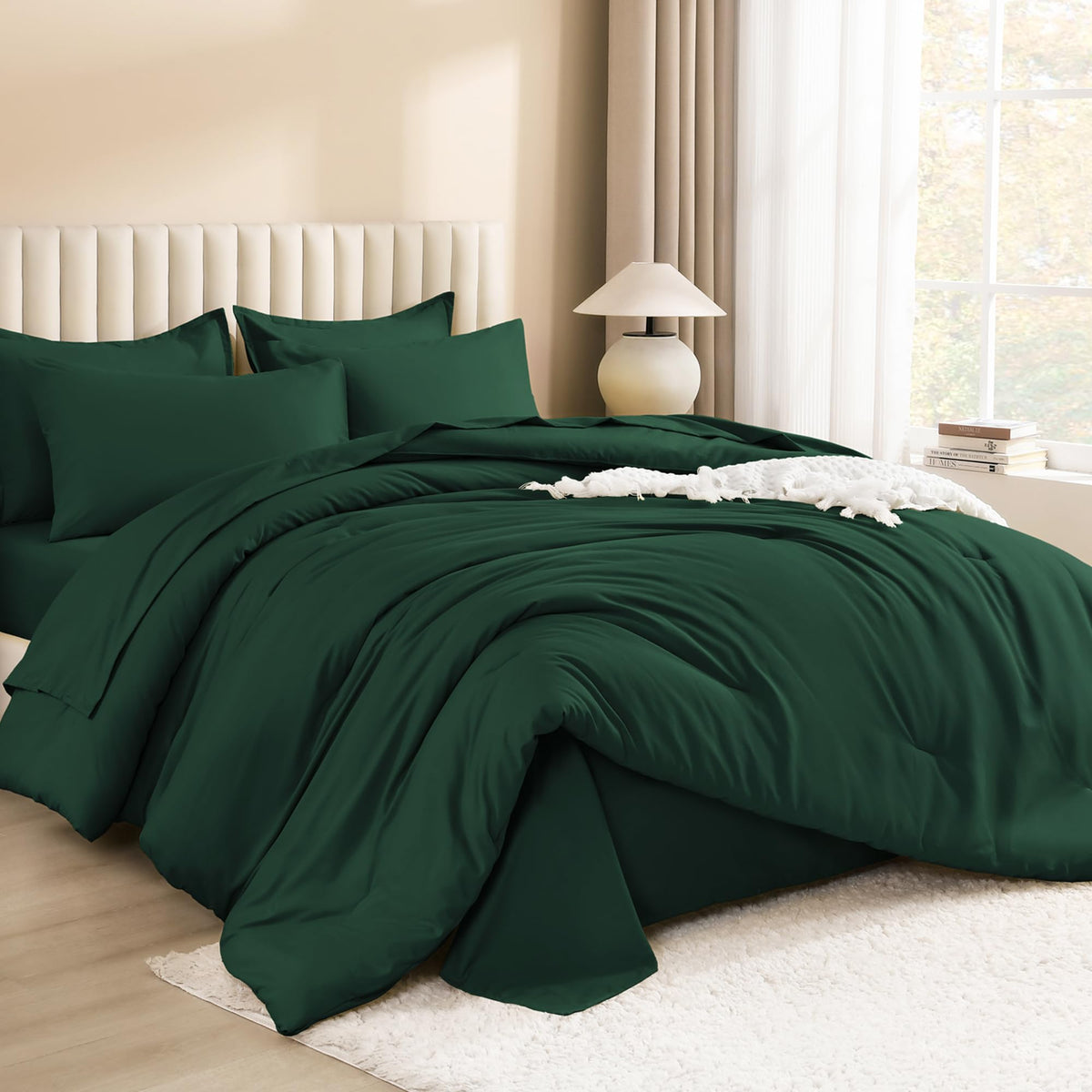 Litanika comforter set with flat sheet in emerald green for complete bed layering.