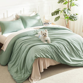 Litanika king size comforter set on bed in sage green, cozy and inviting.