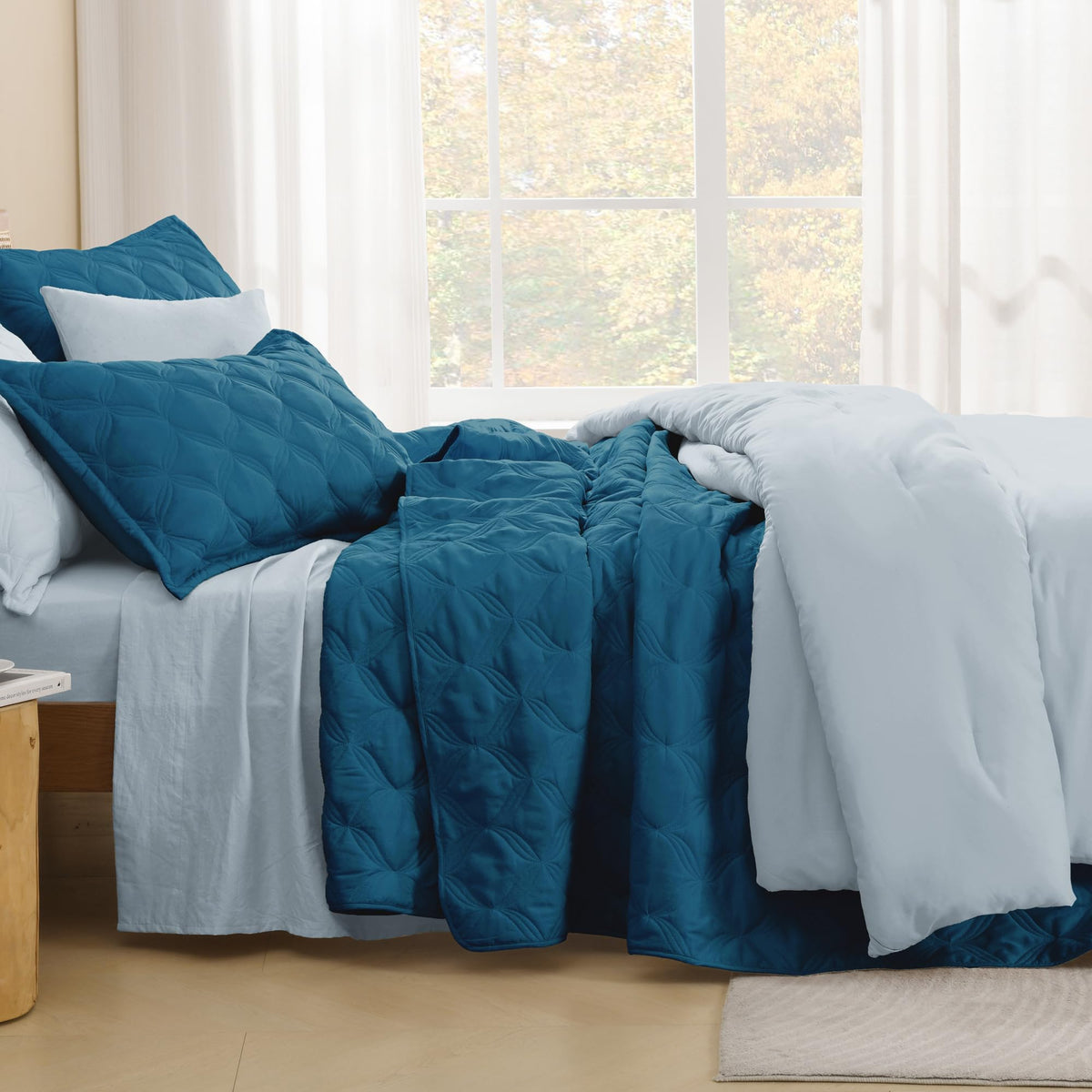 Litanika pillow shams pair with the quilt for a cohesive look.