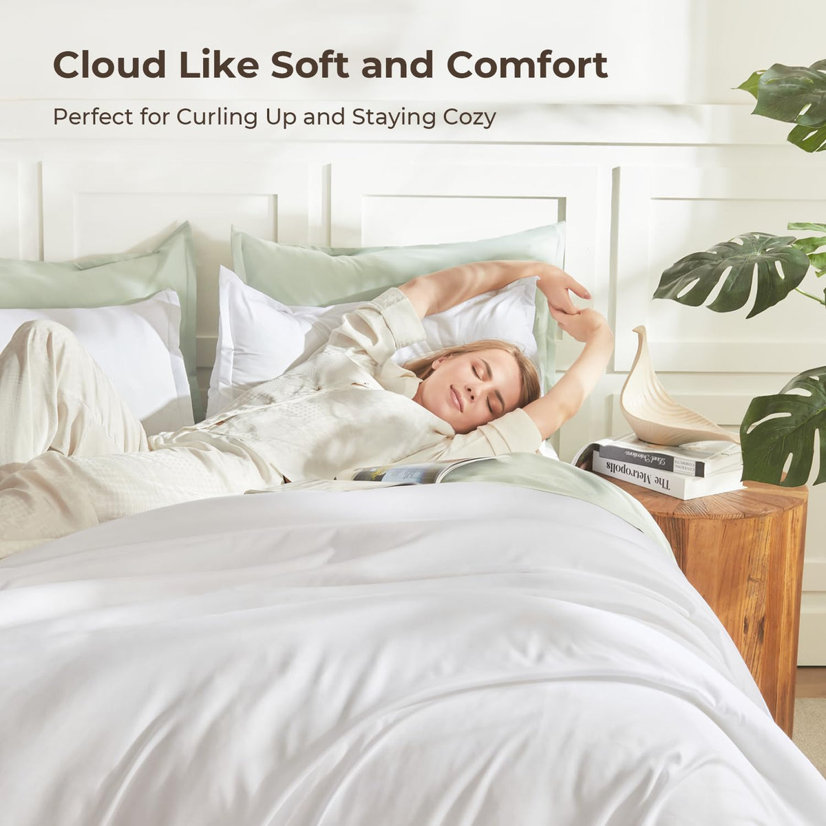 Litanika oversized king white comforter folded close-up, highlighting plush softness.