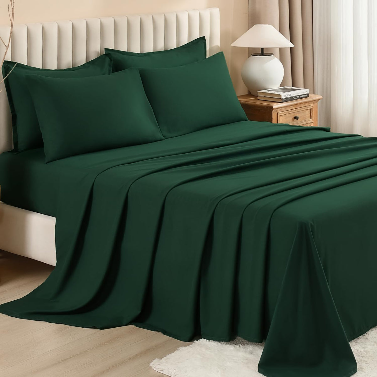 Litanika queen comforter set styled in a modern emerald bedroom