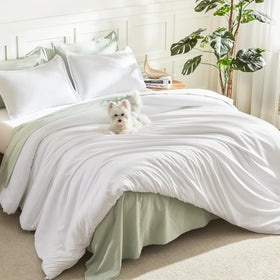 Litanika White Comforter King Set close-up shows soft, textured fabric.