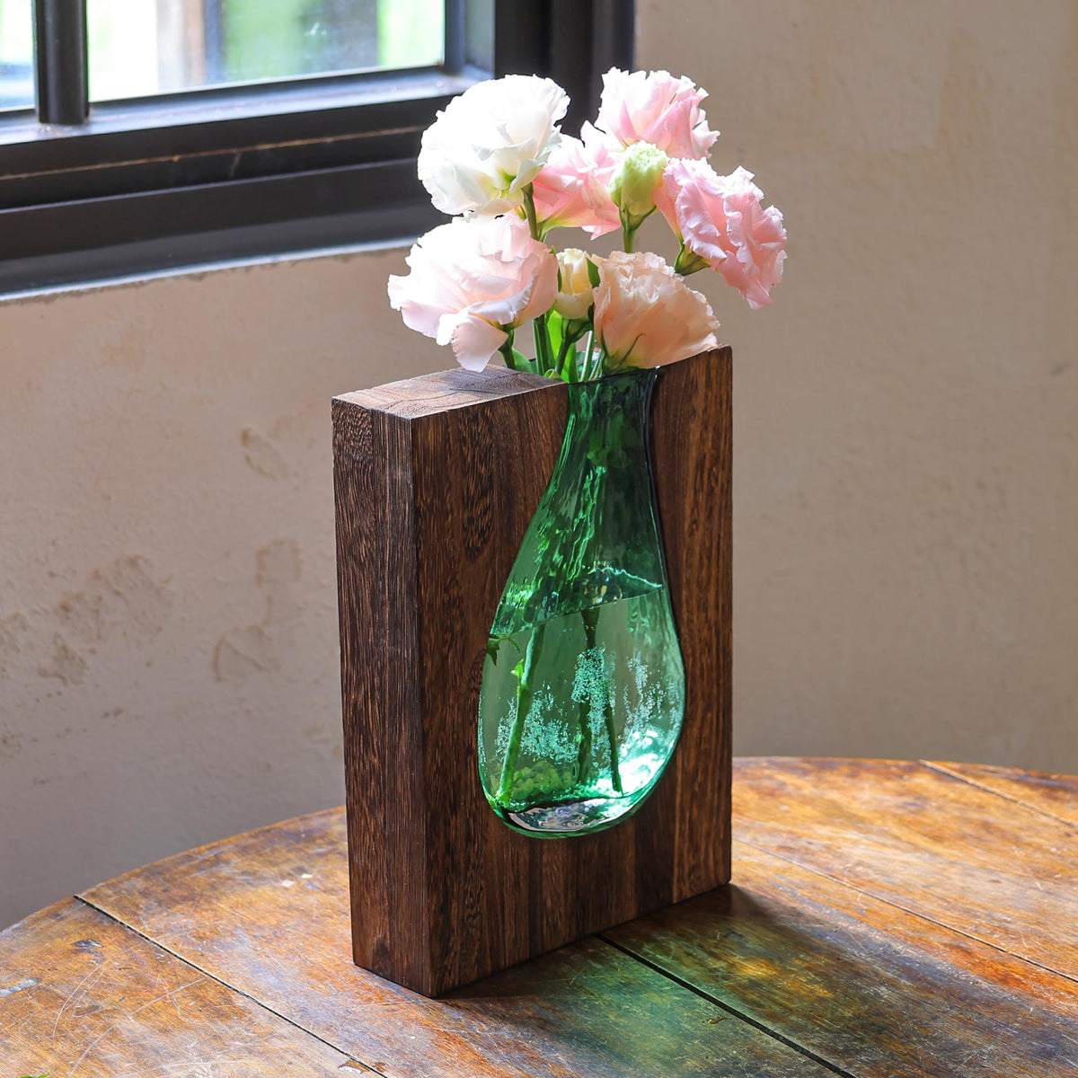 Litivy versatile vase pairs with garden blooms and dried arrangements.