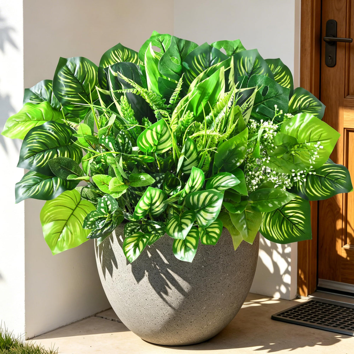 Livole outdoor artificial plants 12pcs: lush, maintenance-free greenery for patios.