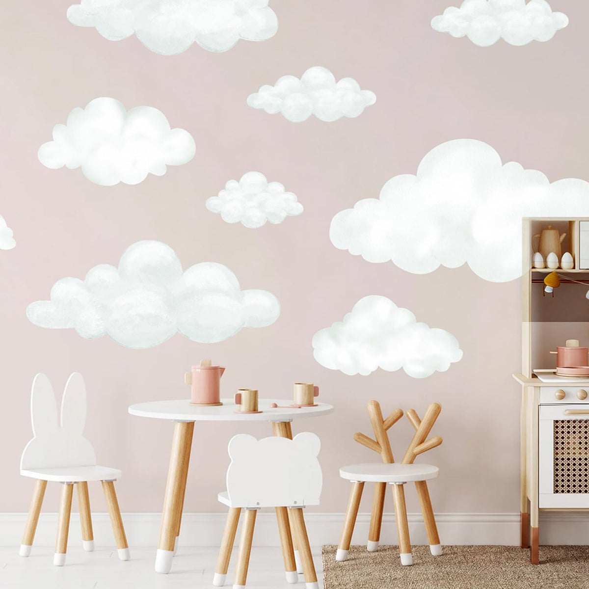 Liwo fabric cloud wall decals brighten a kid's playroom with a dreamy sky.