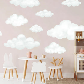 Liwo fabric cloud wall decals brighten a kid's playroom with a dreamy sky.