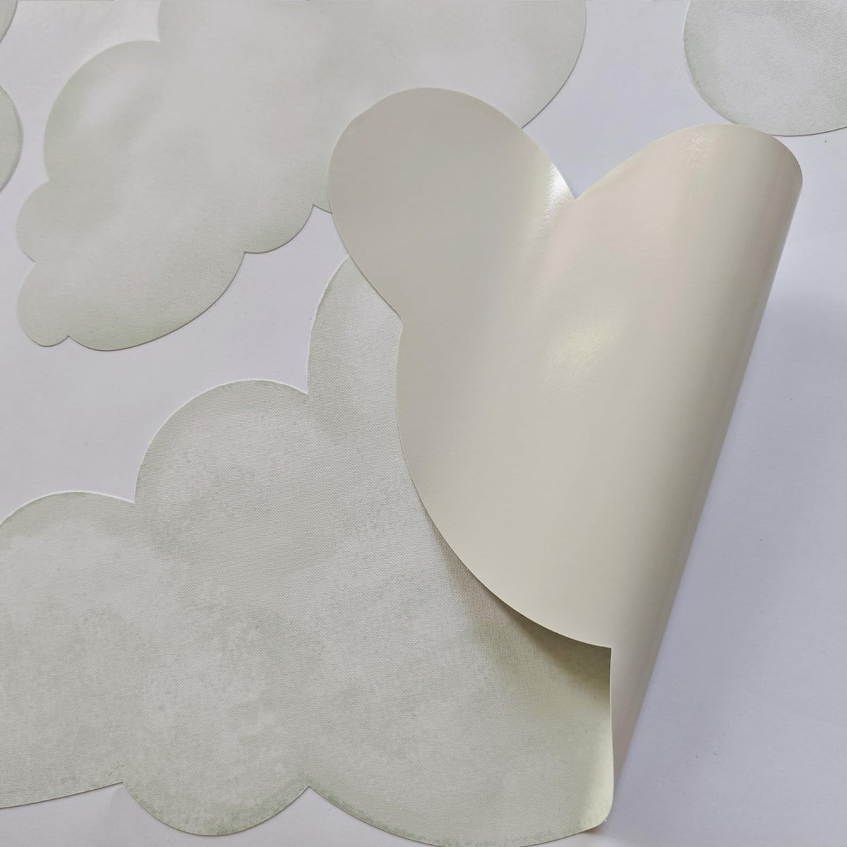 Liwo nine-piece cloud decals form a gentle sky mural.