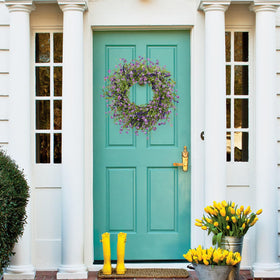 LLZLL artificial spring wreath greets guests with lasting color on porch.