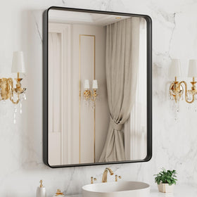 LOAAO bathroom mirror with black metal frame and rounded rectangle silhouette.