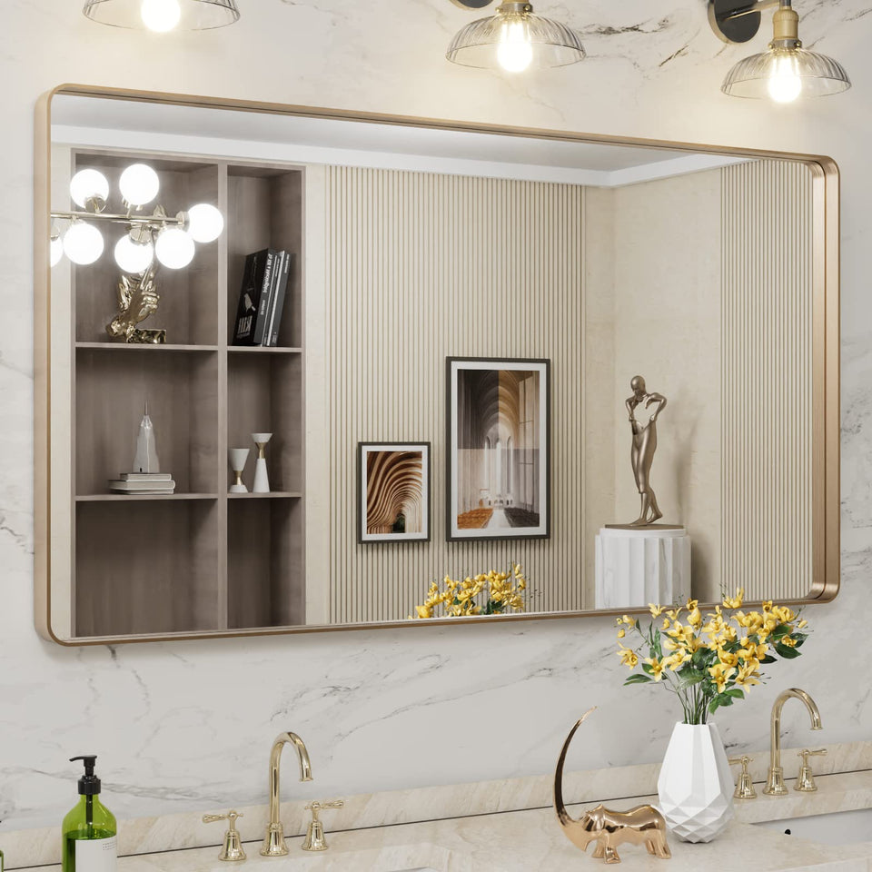 LOAAO 55x30 gold bathroom mirror with rounded frame for a bold focal point
