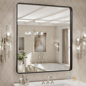 LOAAO bathroom mirror in a 32x36 black frame with a crisp, distortion-free reflection.