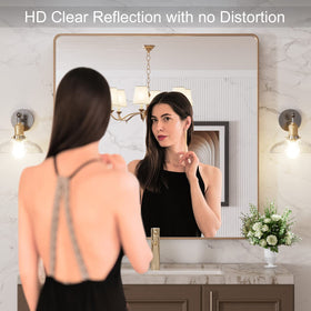 LOAAO rounded gold frame enhances contemporary bathroom aesthetics