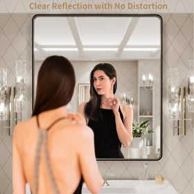Rounded rectangle LOAAO mirror enhances a modern vanity with clean lines.