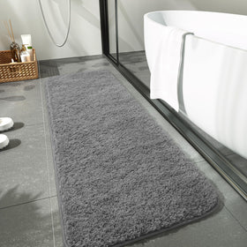 LOCHAS bath mat at tub edge shows quick-drying, absorbent performance
