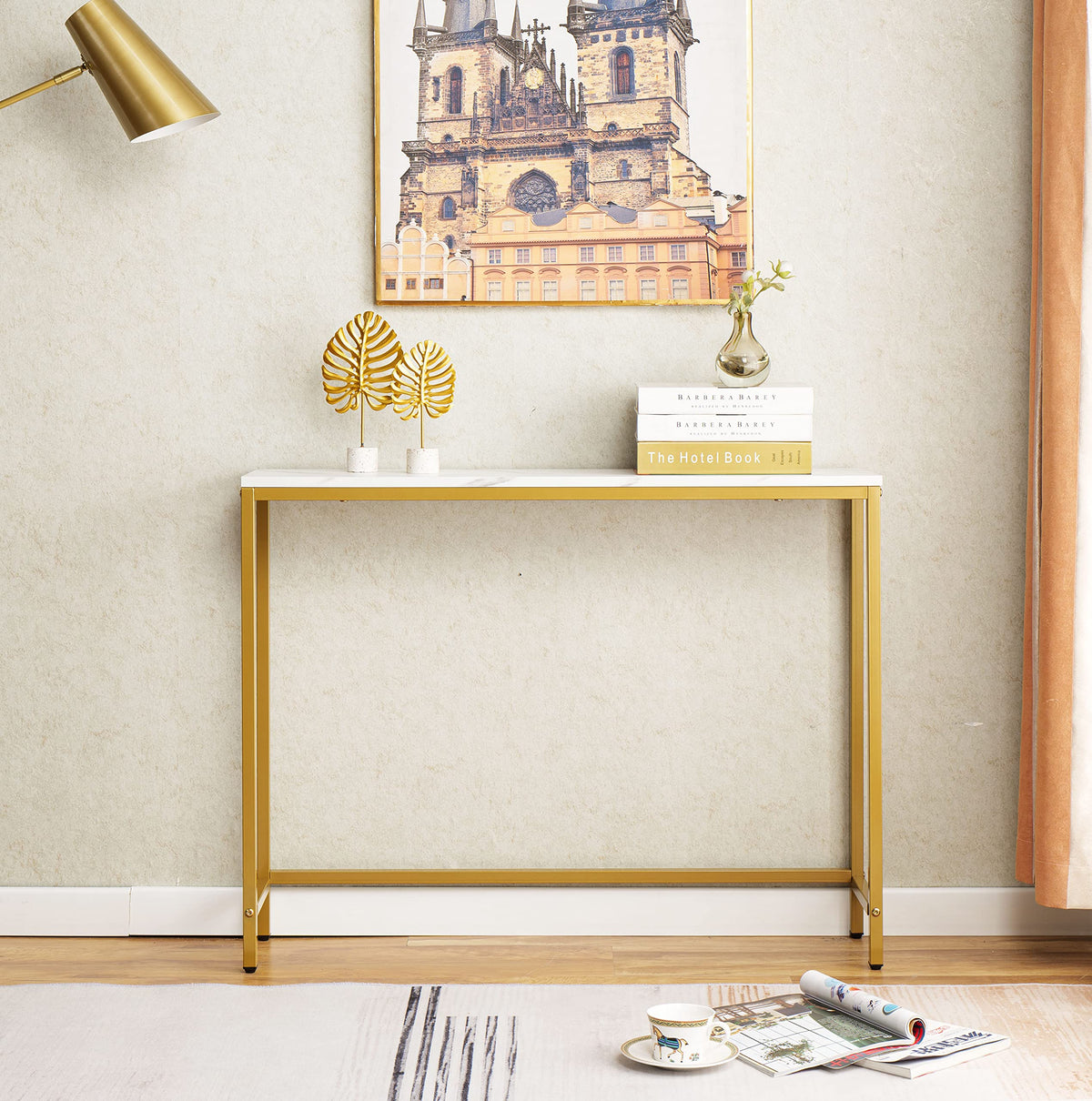 Loglus console table with golden frame, front view adds a luxe living room accent.