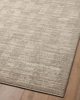 Loloi Darby neutral rug complements modern decor and lighting.