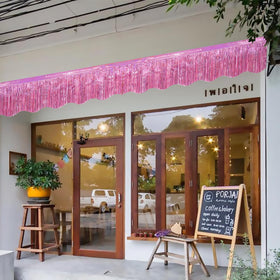 LOLStar parade float garland accents outdoor decor with cheerful pink tones.