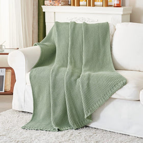 Longhui Bedding chunky knit blanket on a chair for cozy decor