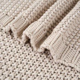Machine-wash friendly Longhui Bedding chunky knit throw in beige for easy care