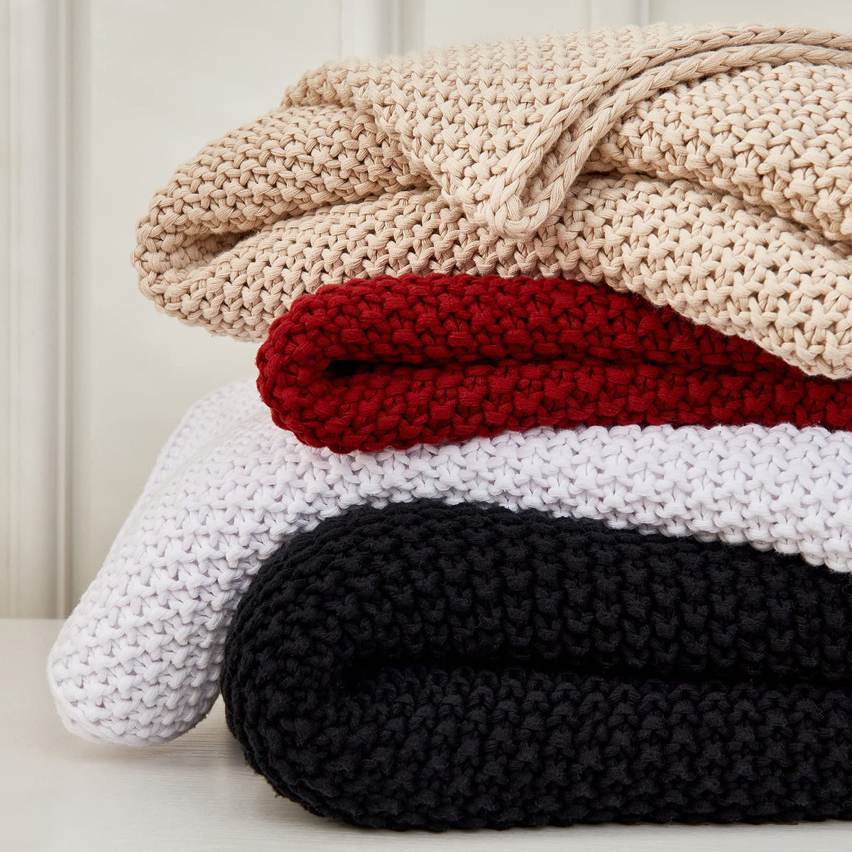 Gift-ready Longhui Bedding chunky-knit blanket in beige, ready for gifting.
