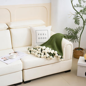 Longhui Bedding Lily Bouquet Throw draped on a sofa for cozy decor
