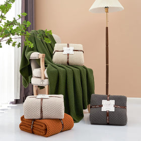Machine-washable beige blanket by Longhui Bedding for easy care.