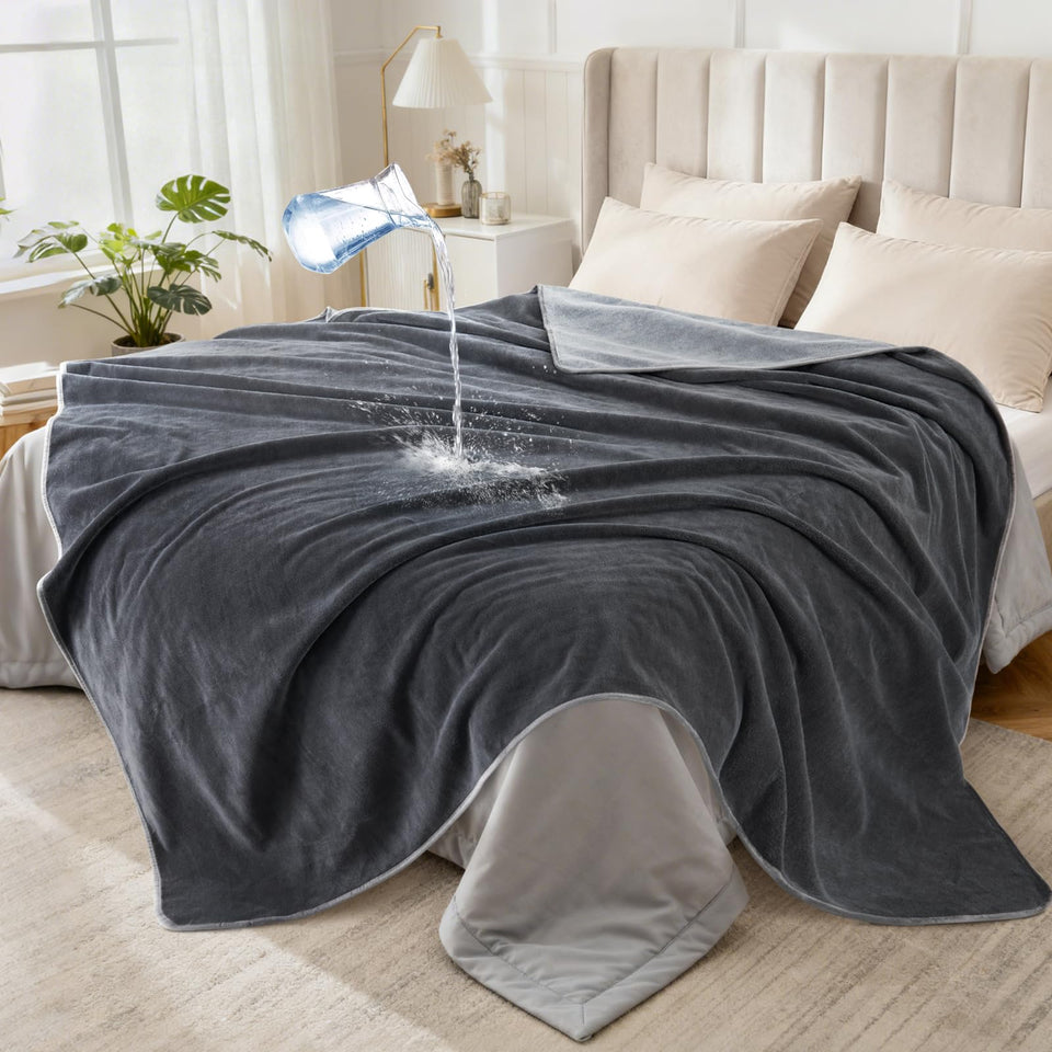 LOOBANI waterproof blanket on bed or sofa with triple-layer protection.