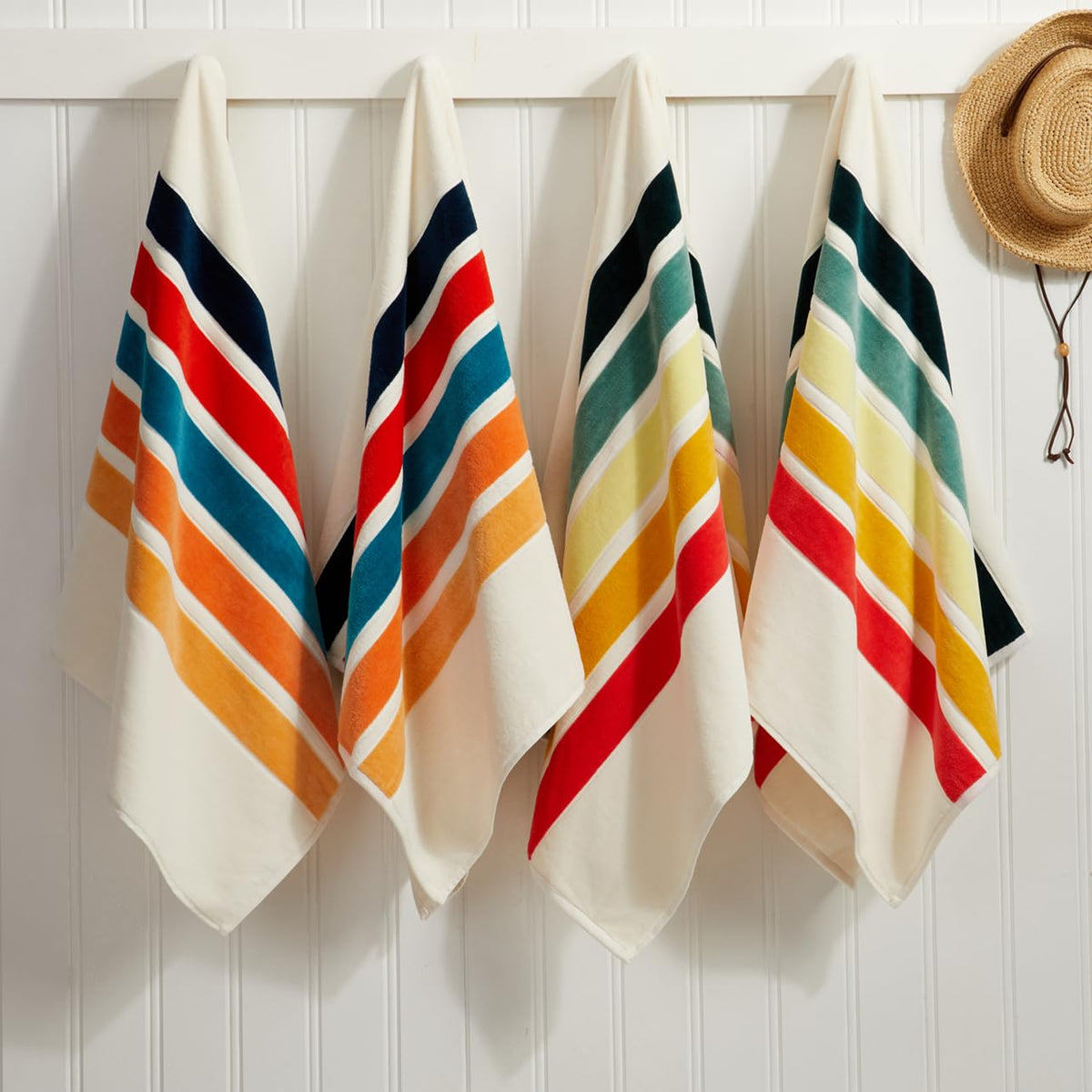 Loon & Lake retro stripes towel spread for yoga or sun-soak sessions.