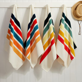Loon & Lake retro stripes towel spread for yoga or sun-soak sessions.