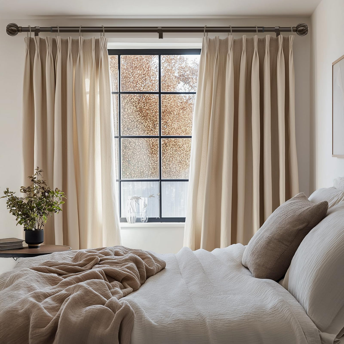 Lootkell bronze curtain rod with decorative ball finials in a stylish setting