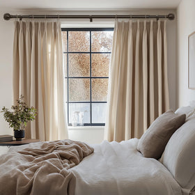 Lootkell bronze curtain rod with decorative ball finials in a stylish setting
