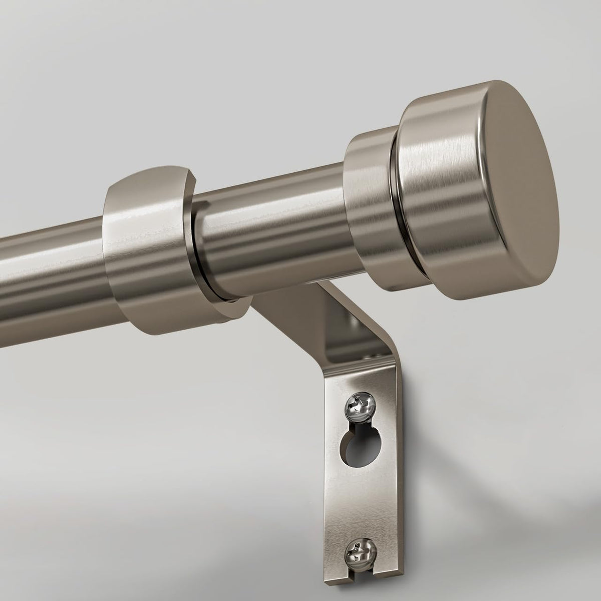 Lootkell brushed nickel curtain rod with adjustable length for flexible window fits.