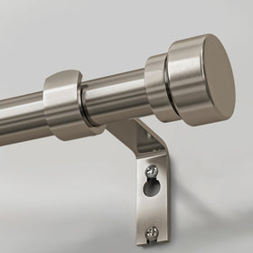 Lootkell brushed nickel curtain rod with adjustable length for flexible window fits.