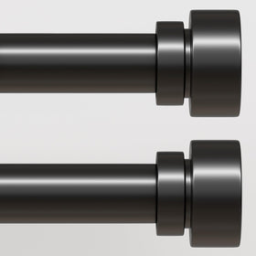 Lootkell curtain rod in black finish close-up highlighting sleek finials for a modern look.