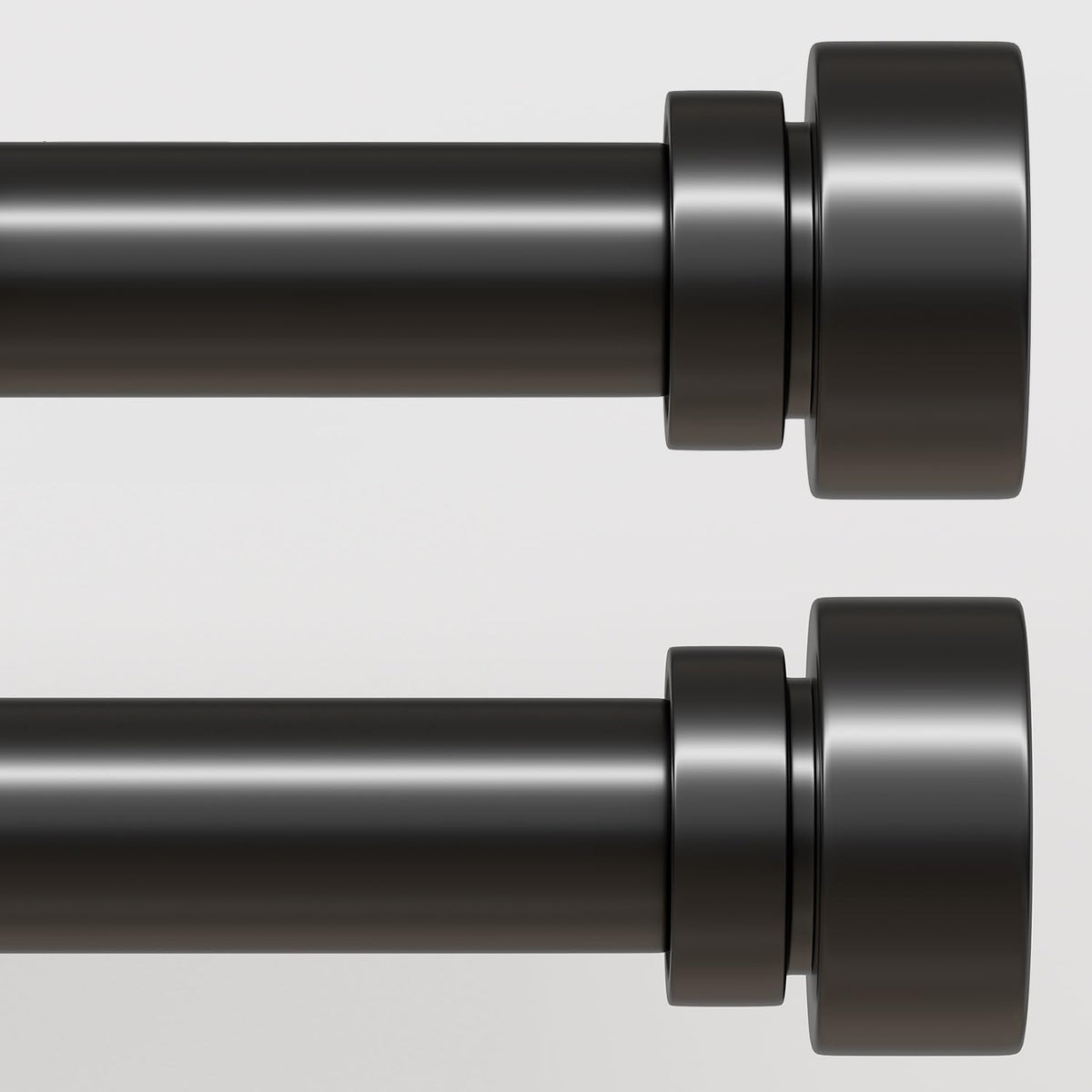 Lootkell black curtain rod set in full length framing a window.