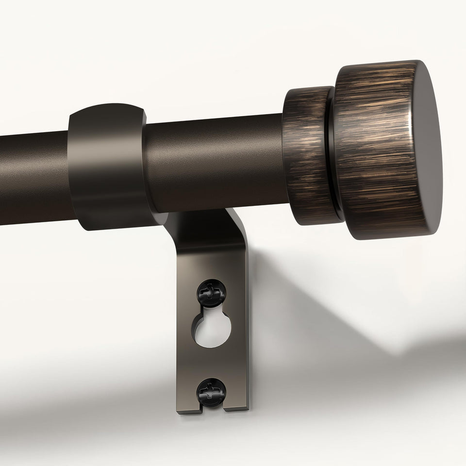 Lootkell curtain rod assembly in antique brown bronze adds classic window charm.