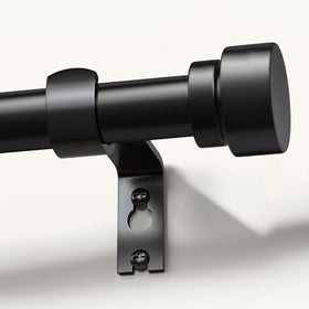 Lootkell modern black curtain rod with decorative finials for a stylish window finish.