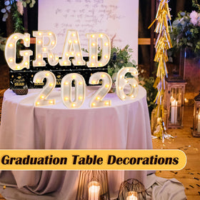 Lotus Hills Grad 2026 letters paired with props for social media photos
