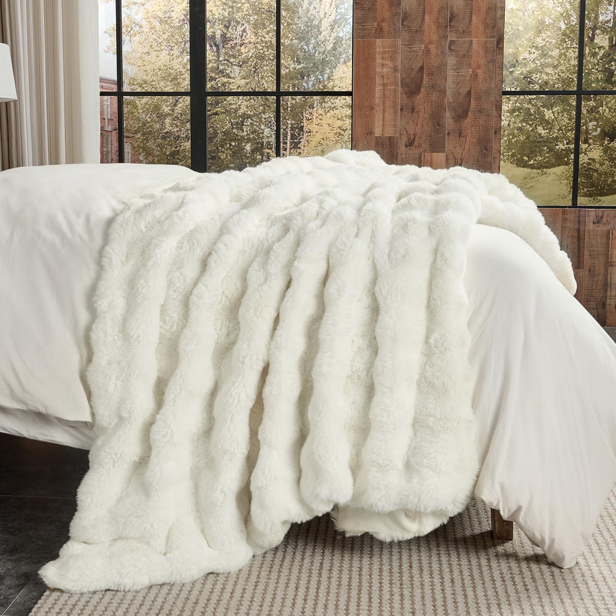 Lotus Karen blanket on couch adds decorative, inviting focal point