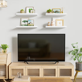 Love-KANKEI nursery setup with white shelves holding toys and books