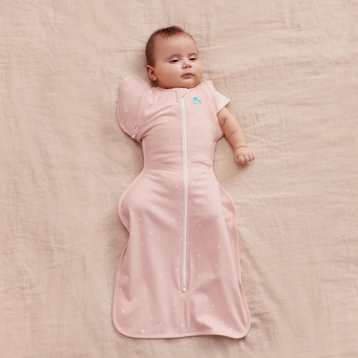 Close-up of zip-off wings on Love to Dream Transition Bag for gradual arms-free sleep.
